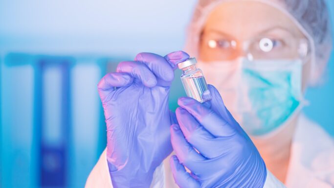 Doctor analyzing unknown MMR vaccine